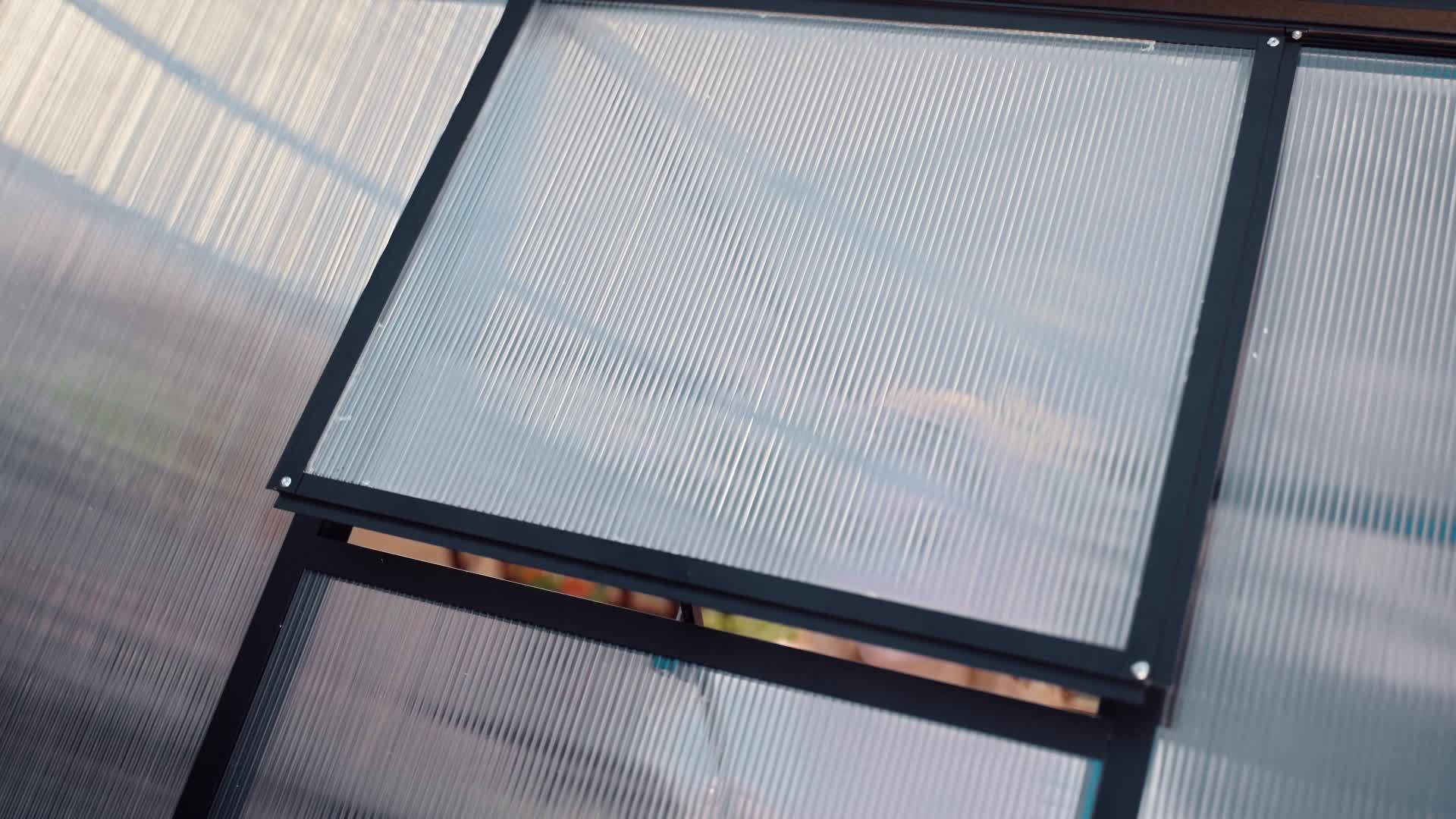 AirWire Heavy-Duty Walk-In Greenhouse with UV-Resistant Polycarbonate Panels & Large Black Aluminum Frame - Easy Assembly, Lockable Door & Roof Vent System, All-Weather Outdoor Garden Greenhouse for Backyard, Balcony, Urban F